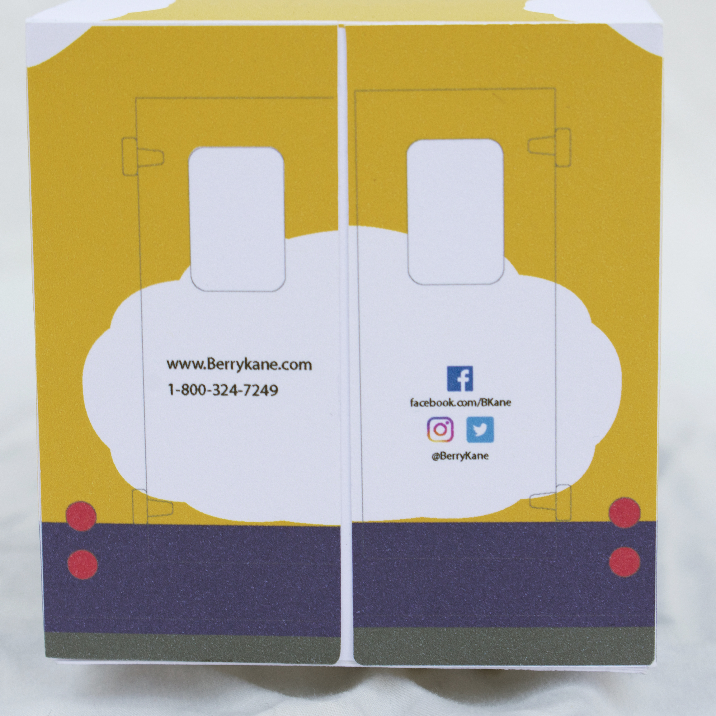 The back of the Berry Kane truck model, features social media and website urls.