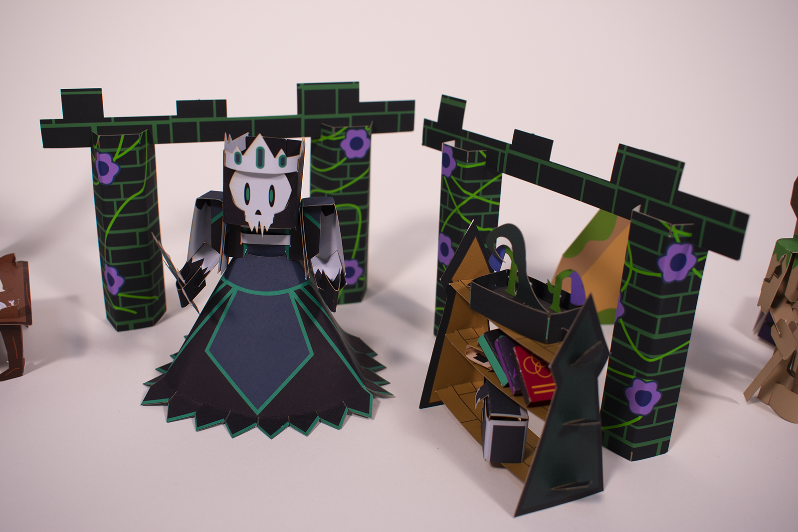 Set Three for Salt Quest, featuring a skeleton with a robe, a bookshelf, and several intimidating pillars